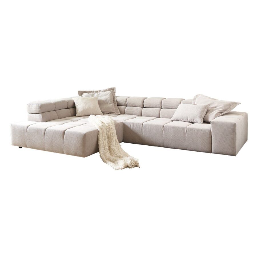 Candy Careno Ecksofa mit verstellbaren Kopfstützen und Ottomane links in Feincord Silber.