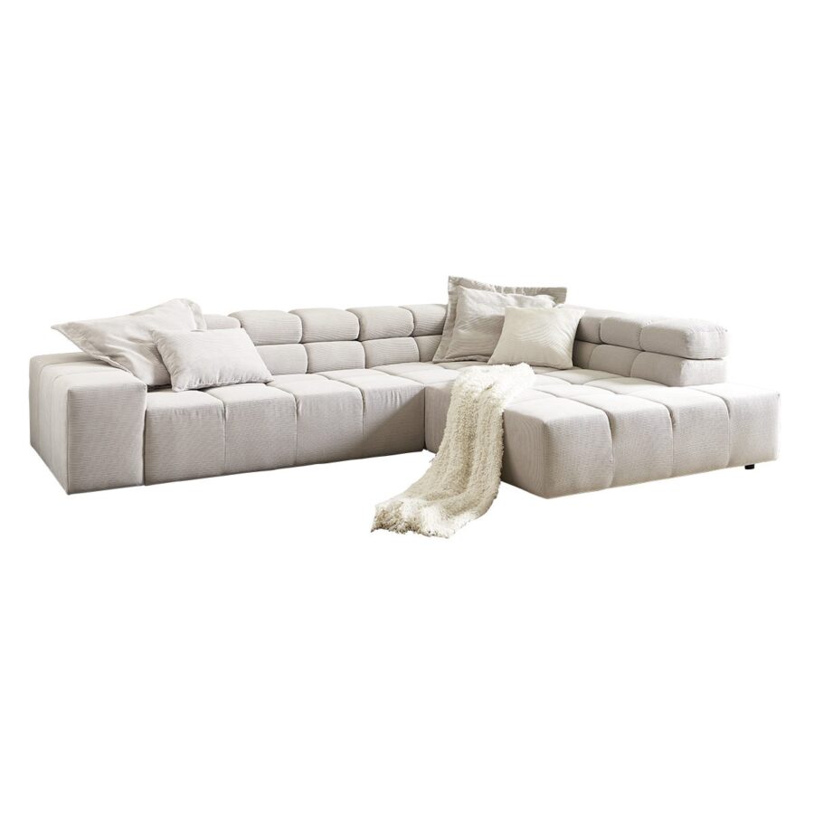 Candy Careno Ecksofa mit verstellbaren Kopfstützen und Ottomane rechts in Feincord Silber.