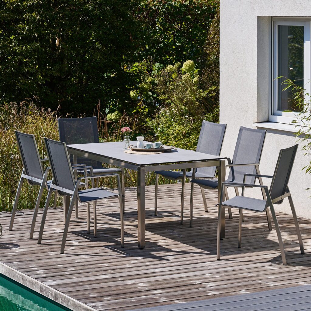 CASA DOMA Mineo/Carini Gartenmöbel-Set 7-tlg., Gestelle Edelstahl gebürstet, Sitzfläche Textilgewebe Sunproof® Sling schwarz/silber, Armlehnen Alu, Tischplatte HPL, 160×90 cm