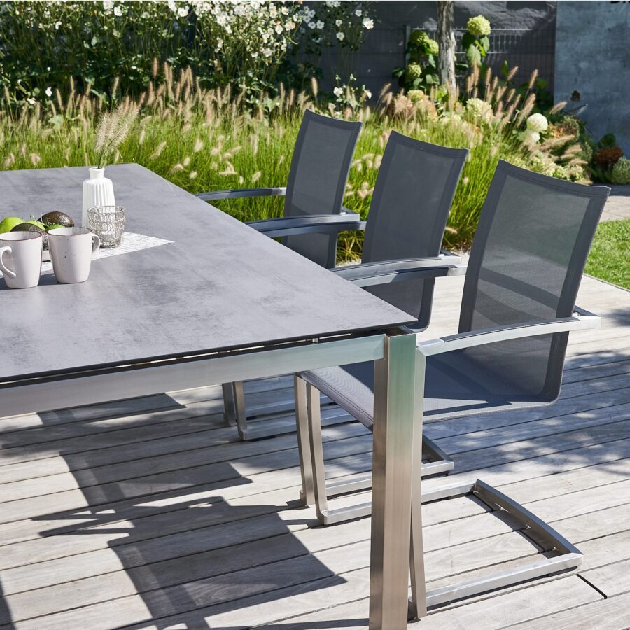 CASA DOMA Mineo/Carini Gartenmöbel-Set 7-tlg., Gestelle Edelstahl gebürstet, Sitzfläche Textilgewebe Sunproof® Sling schwarz/silber, Armlehnen Alu, Tischplatte HPL, 210×100 cm