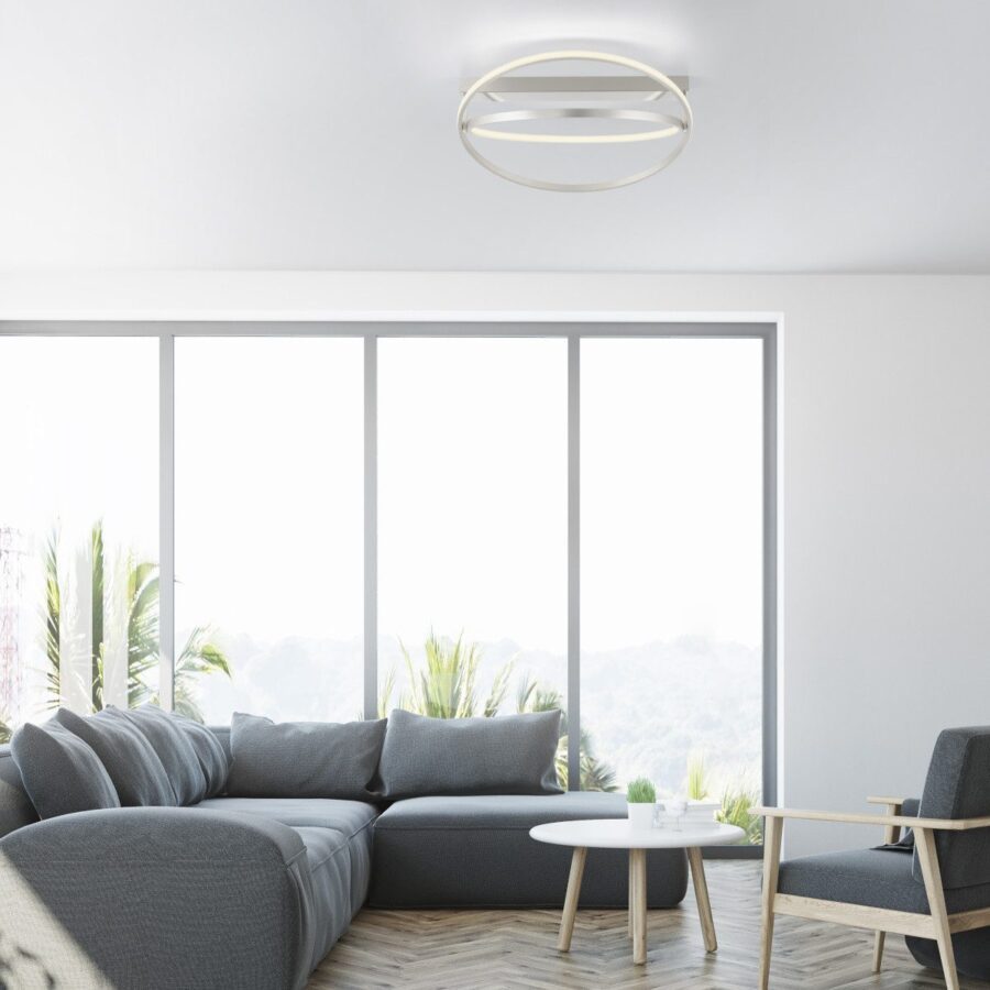 White living room interior with a gray sofa, front